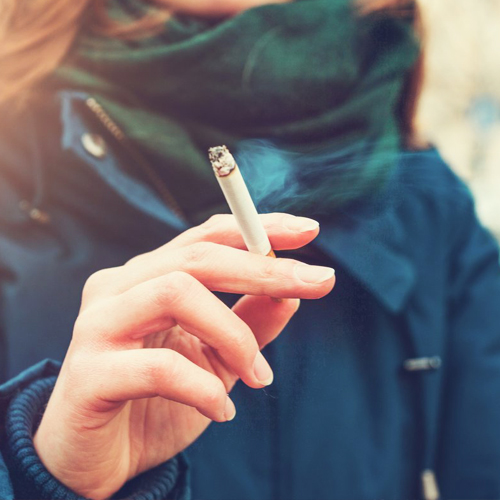 woman smoking cigarette